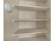 The walk-in closet has multiple shelves for ample storage and organization at 6148 Whitelion Walk St, Las Vegas, NV 89148