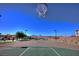 Community basketball court with mountain views offers residents an active lifestyle at 677 Viale Machiavelli Ln, Henderson, NV 89011