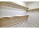 Spacious walk-in closet with built-in shelving for organized storage and easy access at 677 Viale Machiavelli Ln, Henderson, NV 89011