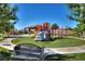 Community playground with colorful equipment and seating area for outdoor fun at 677 Viale Machiavelli Ln, Henderson, NV 89011