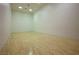 Indoor racquetball court featuring wood flooring, smooth walls, and ample space for players at 677 Viale Machiavelli Ln, Henderson, NV 89011