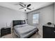 Bedroom with ceiling fan, window, bed, and carpet at 6773 Bristle Falls St, Las Vegas, NV 89149