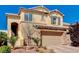 Beautiful two-story home featuring a well-manicured front yard and an attached two-car garage at 6773 Bristle Falls St, Las Vegas, NV 89149