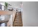 Wooden staircase showing an open floor plan between the first and second stories at 6773 Bristle Falls St, Las Vegas, NV 89149