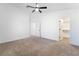This large carpeted bedroom includes an ensuite and walk-in closet, providing comfort and convenience at 80 Sea Holly Way, Henderson, NV 89074