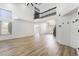 Spacious living room boasting high ceilings, natural light, and sleek wood-look floors at 80 Sea Holly Way, Henderson, NV 89074