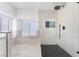 Elegant walk-in shower with black fixtures and tiled bench next to tub at 80 Sea Holly Way, Henderson, NV 89074