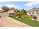 Backyard featuring green artificial turf, play area, and comfortable seating at 8369 Eagle Estates Ct, Las Vegas, NV 89131