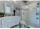 Stylish bathroom featuring a vanity with a sink, a mirror, and a glass-enclosed shower at 8369 Eagle Estates Ct, Las Vegas, NV 89131