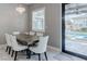 Dining area with natural light and view of the pool area at 8369 Eagle Estates Ct, Las Vegas, NV 89131