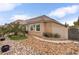Charming home exterior with stone accents, desert landscaping, and a welcoming walkway at 8369 Eagle Estates Ct, Las Vegas, NV 89131