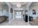 Grand foyer with gleaming marble floors, an elegant chandelier, and views into living spaces at 8369 Eagle Estates Ct, Las Vegas, NV 89131