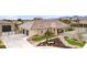 Aerial view of a well manicured single Gathering home with a circular driveway at 8369 Eagle Estates Ct, Las Vegas, NV 89131