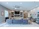 Spacious living room featuring custom built-ins, modern fireplace, and comfortable seating arrangement at 8369 Eagle Estates Ct, Las Vegas, NV 89131