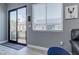 Cozy living room with a sliding glass door leading to the outdoor pool area at 8369 Eagle Estates Ct, Las Vegas, NV 89131