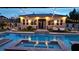 Inviting backyard featuring a sparkling pool, hot tub, string lights, and outdoor seating at 8369 Eagle Estates Ct, Las Vegas, NV 89131
