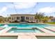 Relaxing pool area with hot tub, backyard lounge chairs, and privacy landscaping at 8369 Eagle Estates Ct, Las Vegas, NV 89131