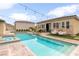 Gorgeous backyard pool with spa and outdoor seating, perfect for entertaining guests at 8369 Eagle Estates Ct, Las Vegas, NV 89131