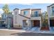 Charming two-story home featuring an attached garage and small balcony at 9105 Captivating Ave, Las Vegas, NV 89149