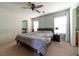 Relaxing bedroom with ceiling fan, soft lighting, and a calm atmosphere at 9105 Captivating Ave, Las Vegas, NV 89149