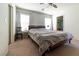 Comfortable bedroom featuring natural light and neutral decor at 9105 Captivating Ave, Las Vegas, NV 89149