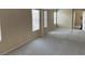 Spacious bedroom featuring neutral walls, plush carpeting, and mirrored closet doors at 9303 Gilcrease Ave # 2164, Las Vegas, NV 89149