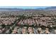 Extensive aerial view of a large residential area with beautiful trees and tiled rooftops at 9625 Beach Water Cir, Las Vegas, NV 89117
