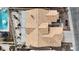 Aerial rooftop view of this home with a private pool, desert landscaping, and tiled roofing at 9625 Beach Water Cir, Las Vegas, NV 89117