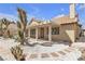 Spacious backyard features a covered patio, desert landscaping at 9625 Beach Water Cir, Las Vegas, NV 89117