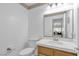 Simple bathroom features a single sink vanity and neutral finishes at 9625 Beach Water Cir, Las Vegas, NV 89117