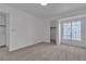Simple bedroom featuring neutral walls and carpet floors at 9625 Beach Water Cir, Las Vegas, NV 89117
