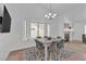 Modern dining area with tiled floors and contemporary decor at 9625 Beach Water Cir, Las Vegas, NV 89117