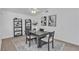 Dining room with decorative artwork and a four-chair dark wood dining set at 9625 Beach Water Cir, Las Vegas, NV 89117