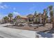 Charming single-story home featuring a three car garage and desert landscaping at 9625 Beach Water Cir, Las Vegas, NV 89117
