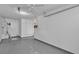 Two car garage with bright lighting and a side entry door at 9625 Beach Water Cir, Las Vegas, NV 89117