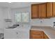 Well-equipped laundry room with a washer, dryer, and storage cabinets at 9625 Beach Water Cir, Las Vegas, NV 89117
