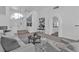 Bright living room showcasing neutral tones and a stylish area rug at 9625 Beach Water Cir, Las Vegas, NV 89117