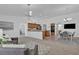 Spacious open living space with kitchen, dining area, and comfortable seating at 9625 Beach Water Cir, Las Vegas, NV 89117