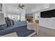 Bright main bedroom with a fireplace, ceiling fan, and serene atmosphere at 9625 Beach Water Cir, Las Vegas, NV 89117