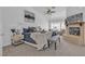 Inviting main bedroom with a fireplace, ceiling fan, and natural light at 9625 Beach Water Cir, Las Vegas, NV 89117