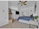 Spacious main bedroom with a ceiling fan, fireplace, and neutral decor at 9625 Beach Water Cir, Las Vegas, NV 89117