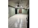 Open living area with tile flooring, ceiling fan, and natural light at , Las Vegas, NV 89108