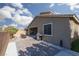 View of covered patio with a gas grill and seating area, great for outdoor entertaining at 1015 Solana Crest St, Henderson, NV 89052