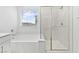 Modern bathroom featuring glass shower and tub at 10165 Canyon Mantle St, Las Vegas, NV 89166