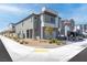 Contemporary two-story home showcasing modern architecture, neutral tones, and xeriscaped front yard at 10165 Canyon Mantle St, Las Vegas, NV 89166