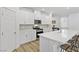Bright kitchen featuring quartz countertops, stainless steel appliances, and ample storage space at 10165 Canyon Mantle St, Las Vegas, NV 89166