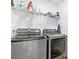 Clean laundry room with modern washer and dryer at 10165 Canyon Mantle St, Las Vegas, NV 89166