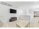 Modern living room features a tv, carpet floors, and ample open space for relaxing or entertaining at 10165 Canyon Mantle St, Las Vegas, NV 89166