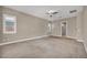 Bright, spacious bedroom with neutral walls, plush carpeting, and ample natural light at 10348 Bressana Dr, Las Vegas, NV 89135