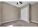 This bedroom features a spacious closet with sliding doors and neutral paint at 10348 Bressana Dr, Las Vegas, NV 89135